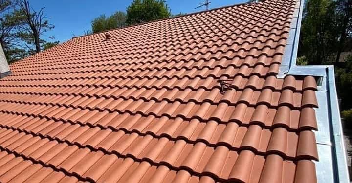 Toiture en tuiles romanes entièrement rénovée - Bruges